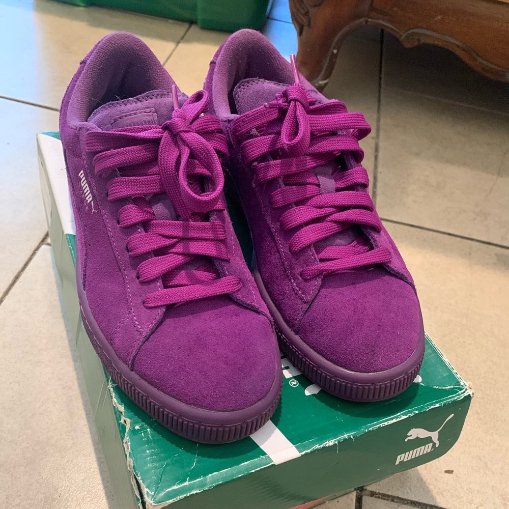 Purple suede pumas